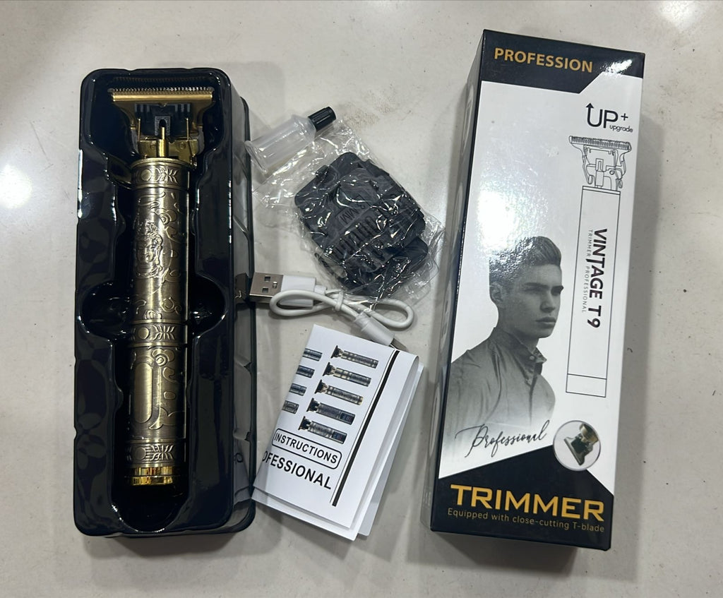 Upgrade your grooming routine with the Vintage T9 Metal Body Trimmer, a powerful and stylish tool built for precision and durability. Crafted with a solid metal body and equipped with sharp stainless-steel blades, this professional-grade trimmer ensures s